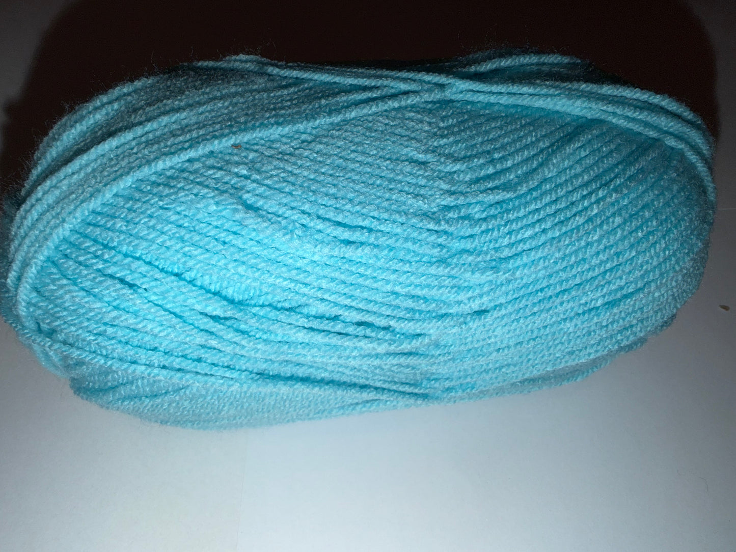 Custom Reversible Beanies in various handmade wooly color combinations.