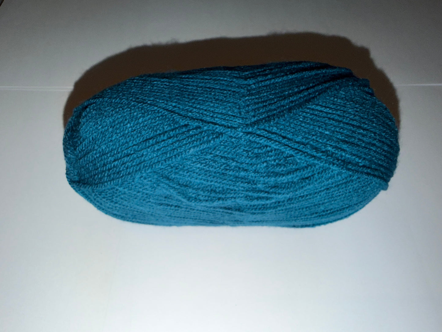 Custom Reversible Beanies in various handmade wooly color combinations.