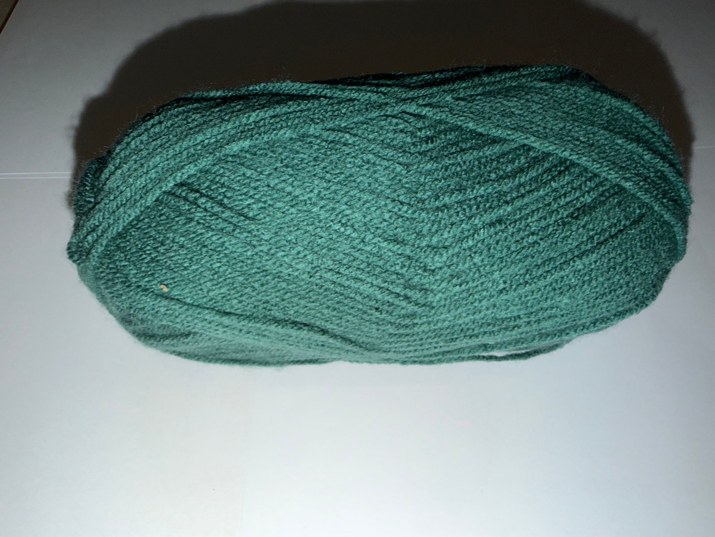 Custom Reversible Beanies in various handmade wooly color combinations.