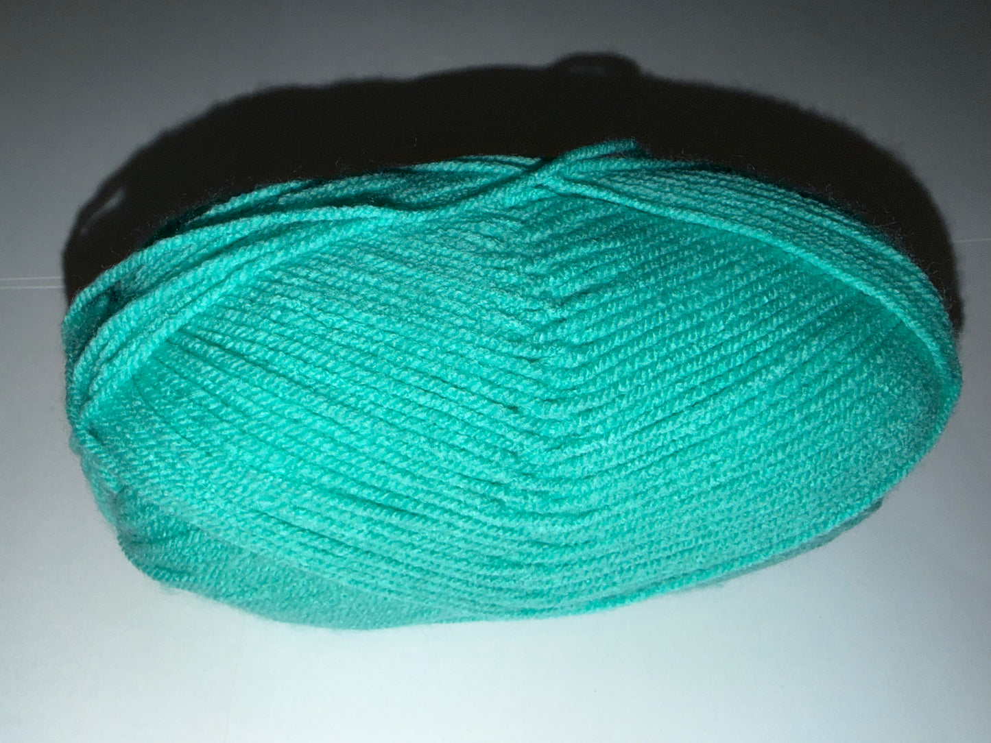 Custom Reversible Beanies in various handmade wooly color combinations.