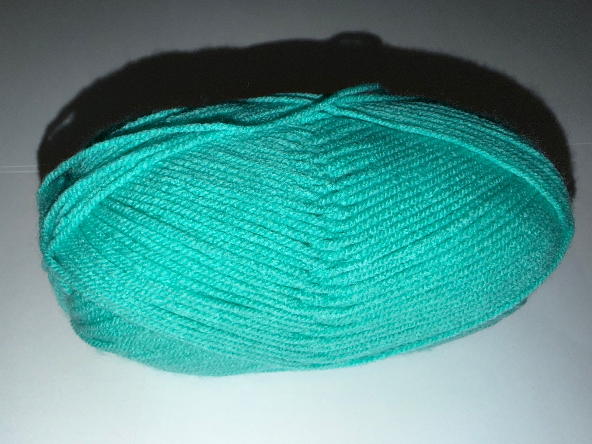 Custom Reversible Beanies in various handmade wooly color combinations.