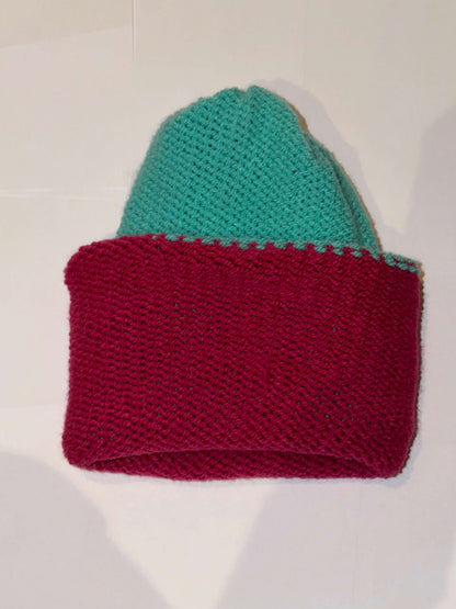 Handmade Reversible Wooly Beanie Aqua and Magenta showing the two-tone artisanal knit design.